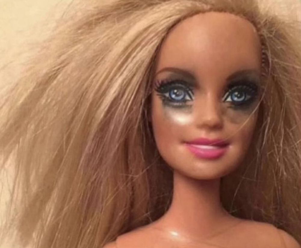 a Barbie with fried hair and running mascara and also she’s dead inside