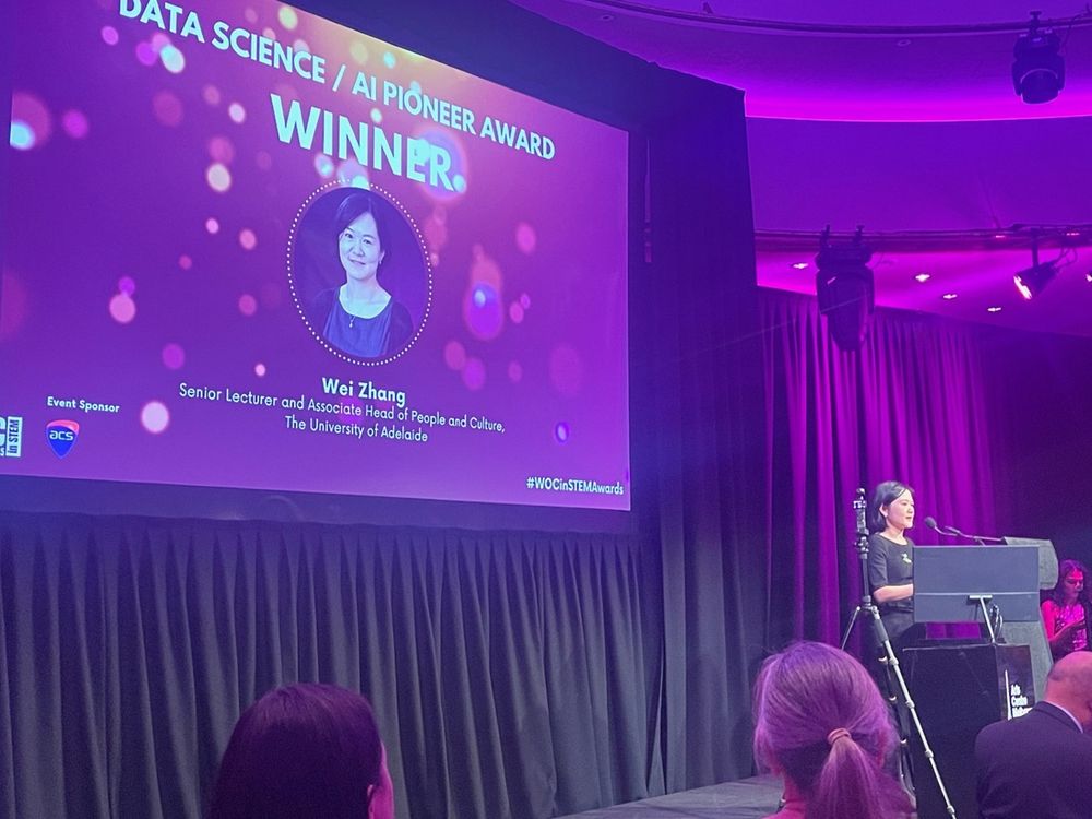 Dr Wei Zhang accepts her award in the Data Science / AI Pioneer category at the Women of Colour in STEM awards, 6 October 2025 in Melbourne