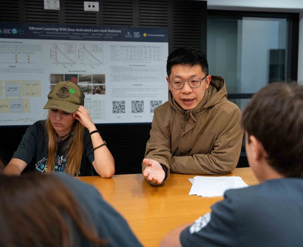 Dr Jinan Zou, AIML Postdoctoral Researcher and Education and Outreach Liaison for the RAIR Centre, engages with Young Future Shapers program participants at the AIML building