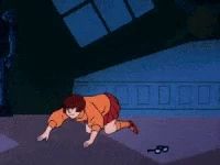 a scooby doo cartoon character crawling on the floor