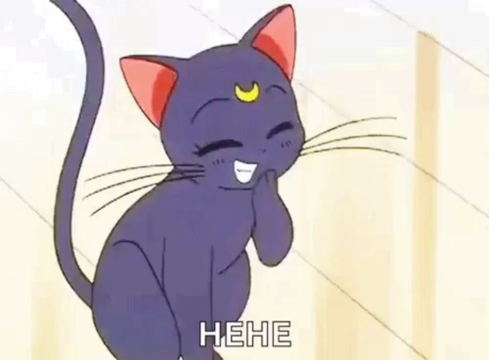 a cartoon cat with a crescent moon on its head is laughing .