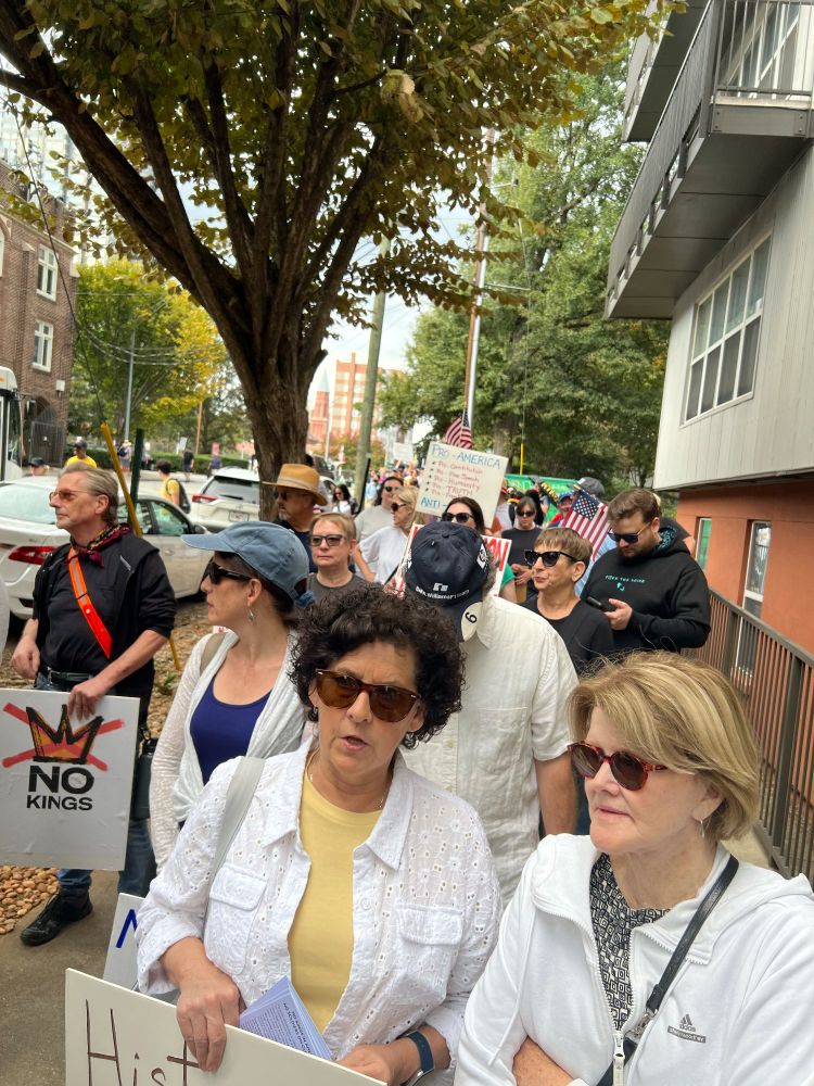 People along the street heading to No Kings in Atlanta.