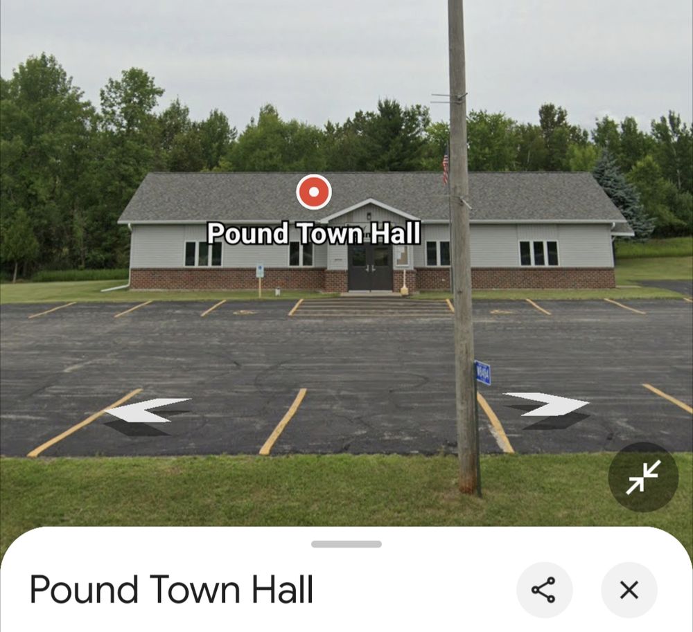 Google Street View showing a nondescript building marked "Pound Town Hall"