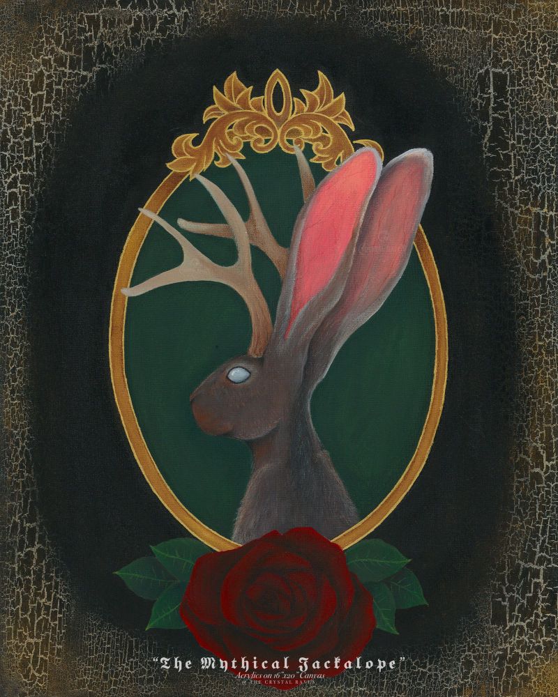 Painting on canvas of a mythical Jackalope set in a gold ornate frame overlaying a green foreground. A red rose is painted at the bottom center just on the edge of the gold frame with the edges all around the whole painting black and gold and cracked and aged. 