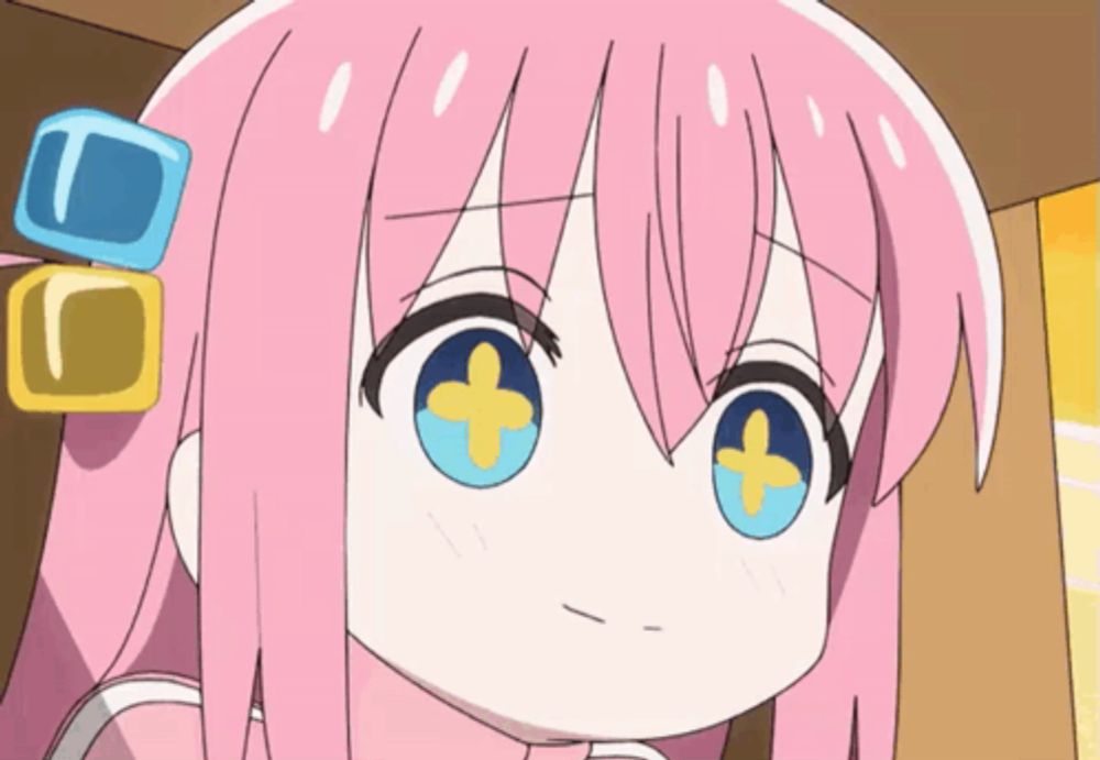 a cartoon girl with pink hair and blue eyes has a yellow cross on her eyes