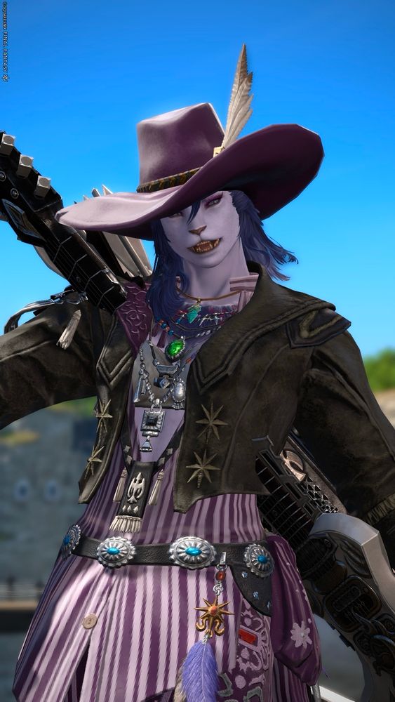 A screenshot of Teegan Irving, a player character in the game Final Fantasy 14. She is a light purple furred Hrothgar with fluffy blue hair and blue eyes, purple leopard spots, and short dark fangs. She is doing a happy victory pose. She is wearing a short leather jacket over a long loose purple stripped shirt, lots of belts and necklaces, and a large wide brimmed purple hat with a feather in it.