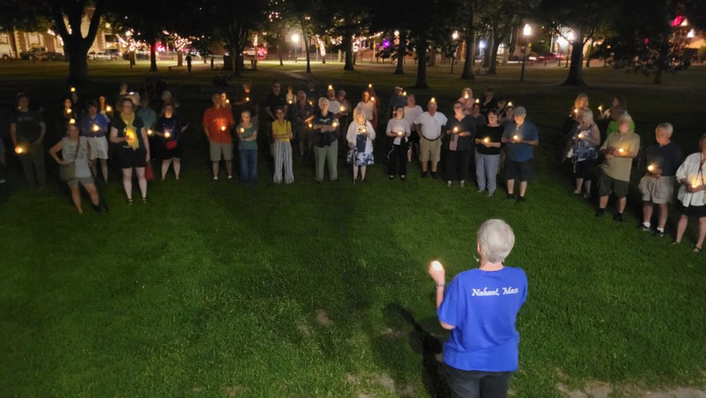 Candlelight vigil participants at Salem Commons.