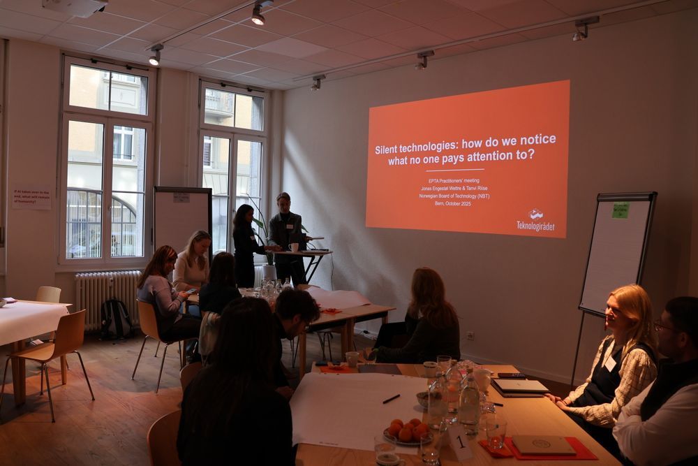 Space where the conference takes place showing the presentation on silent technologies, how do we notice what no one pays attention to