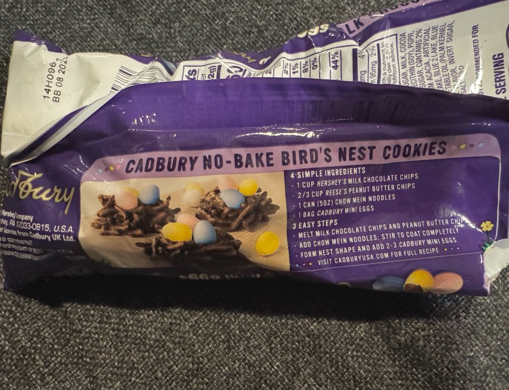 The back of a packet of mini-eggs

Cadbury No-Bake Bird's Nest Cookies
4 SIMPLE INGREDIENTS
- 1 Cup Hershey's Milk Chocolate Chips
- 2/3 Cup Reese's Peanut Butter Cookies
- 1 Can (50OZ) Chow Mein Noodles
- 1 Bag Cadbury Mini Eggs

3 EASY STEPS
- Melt milk chocolate chips and peanut butter chips
- Add chow mein noodles: stir to coat completely
- Form nest shape and add 2-3 Cadbury Mini Eggs
*** Visit Cadburyusa.com for full recipe *** 