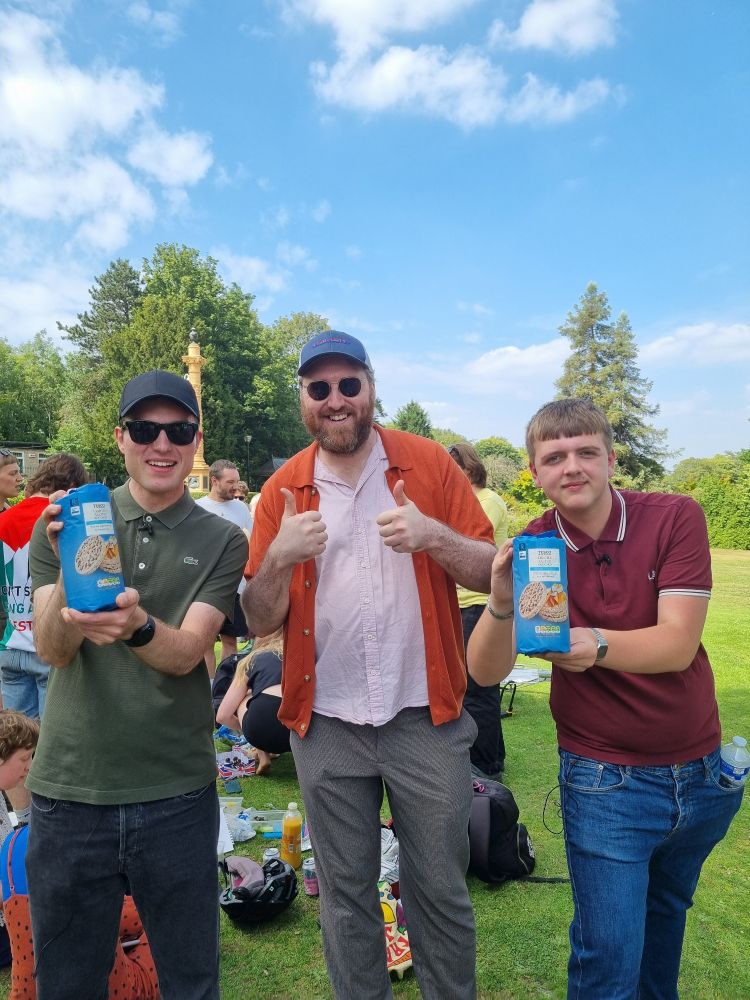 sean morley with billy and isaac the rice cake eaters who are brandishing rice cakes 
