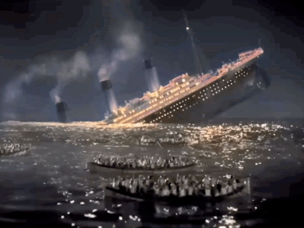 a large ship is sinking in the ocean