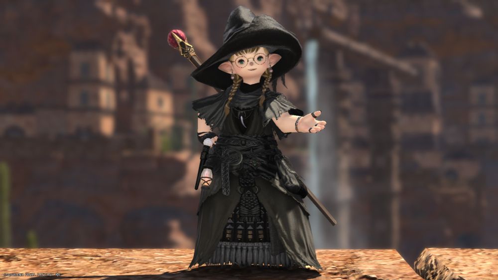 My lalafell in her black mage outfit, she is scheming.