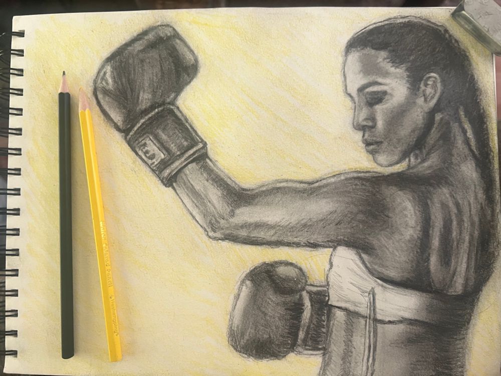 Charcoal sketch of a woman holding her boxing gloves up with a light yellow background penciled in behind her