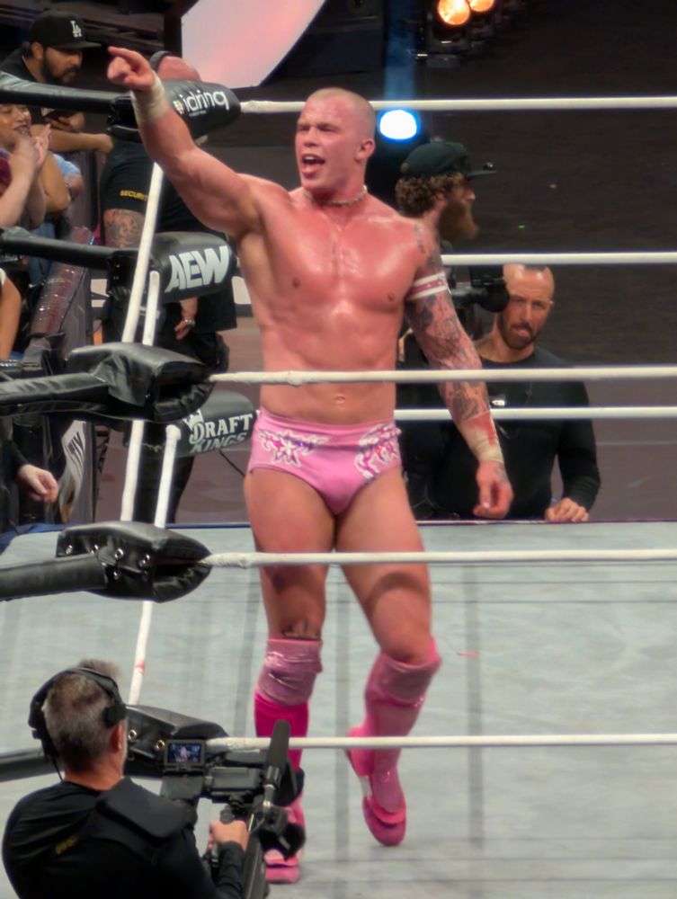 The Protostar, Kyle Fletcher - prancing about the ring in his fetching pink wrestling gear, looking fabulous. 