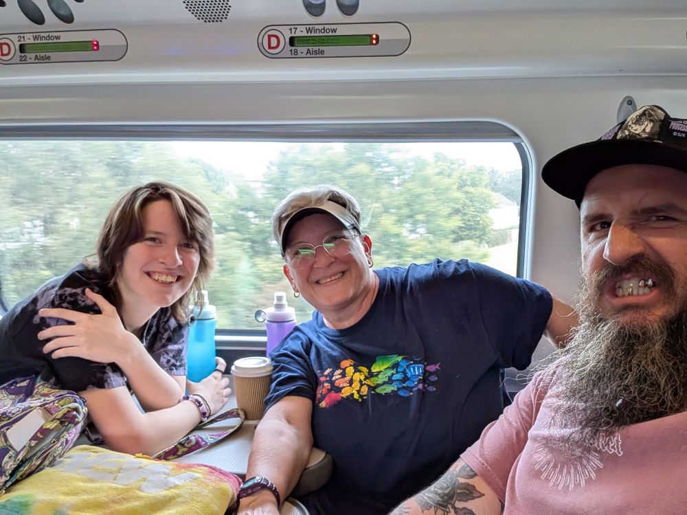 Two fans, and a delightfully snarling Brody King. 