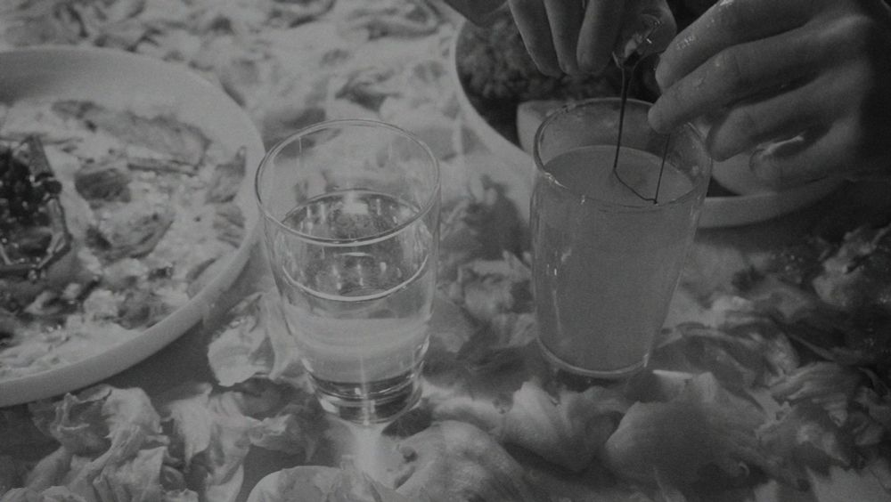 Continued from the prior screenshot, the eyeball is plucked from the dish. Upon being cracked open like an egg its blood is poured into a drink.