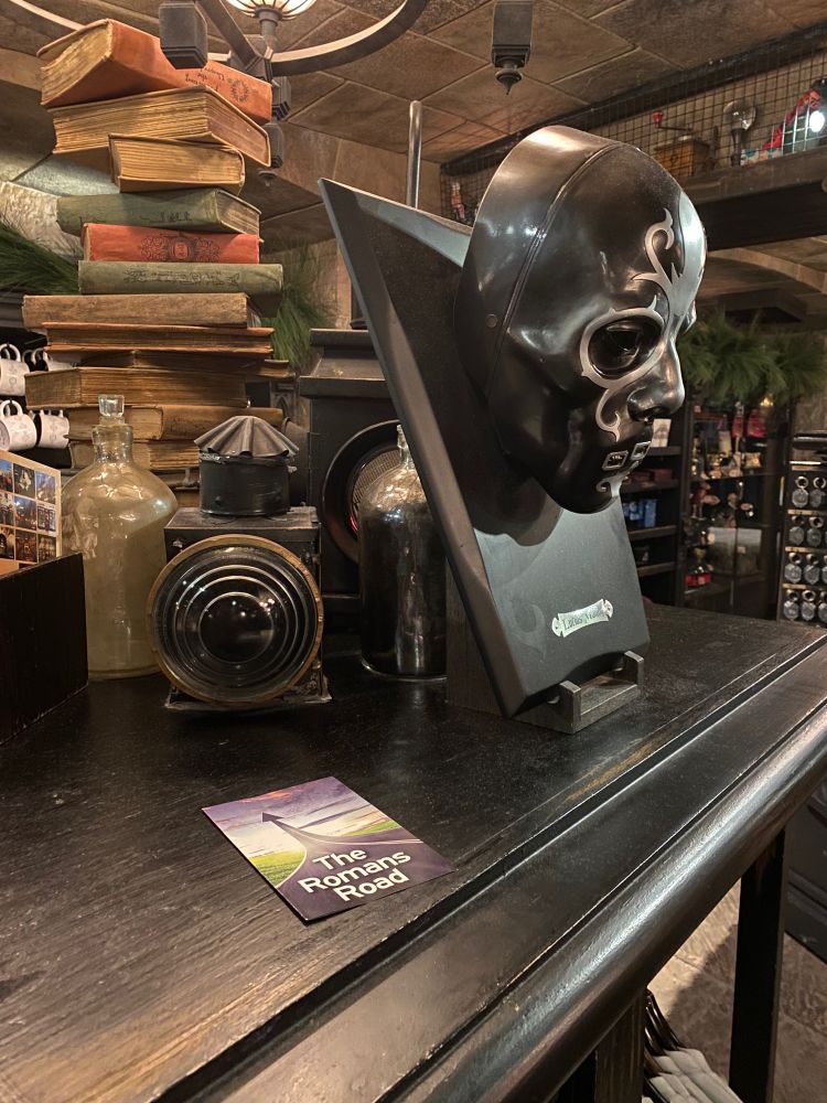 A copy of “The Romans Road” religious tract by Jack Chick sits atop a merchandise display in the gift shop for the Harry Potter attraction at Universal’s Islands of Adventure theme park.