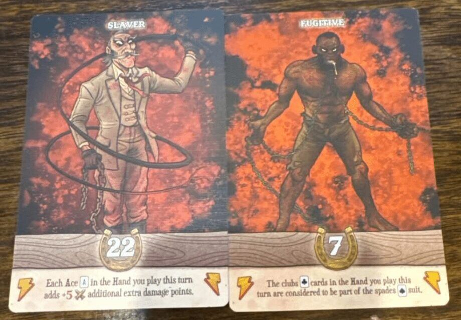 Two playing cards, both with red and black backgrounds, and beige areas towards the bottom explaining the cards' rules in-game. The left shows a white man with moustache wearing an 1800s-style white suit and cracking a whip, and is titled SLAVER. The right card shows a half-naked black man in chains, apparently drooling or foaming at the mouth, titled FUGITIVE. Cards from the board game Ace of Spades.