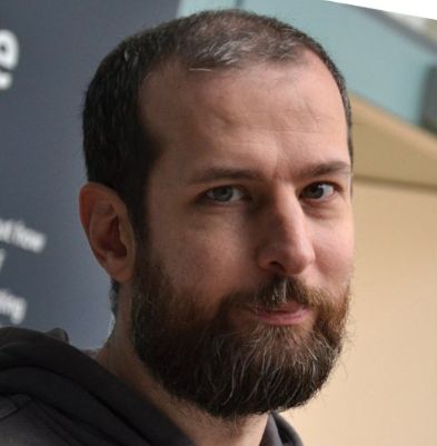 Board game designer Dani Garcia looking at the camera, sporting a beard