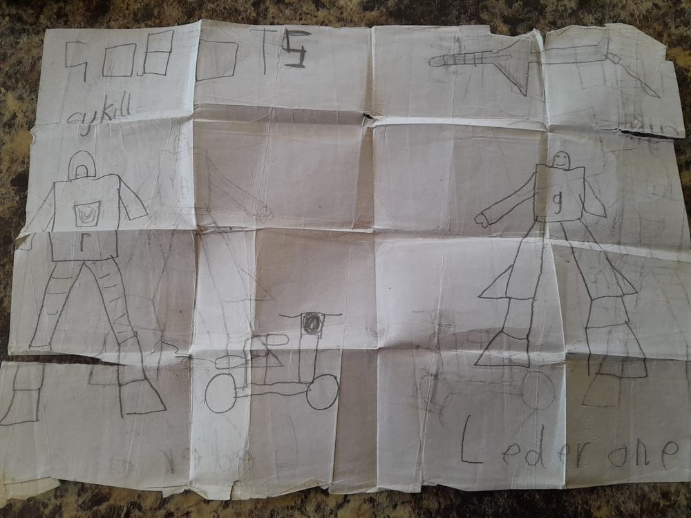 A crude but ADORABLE child's drawing of Robots characters Cykill and Leader One