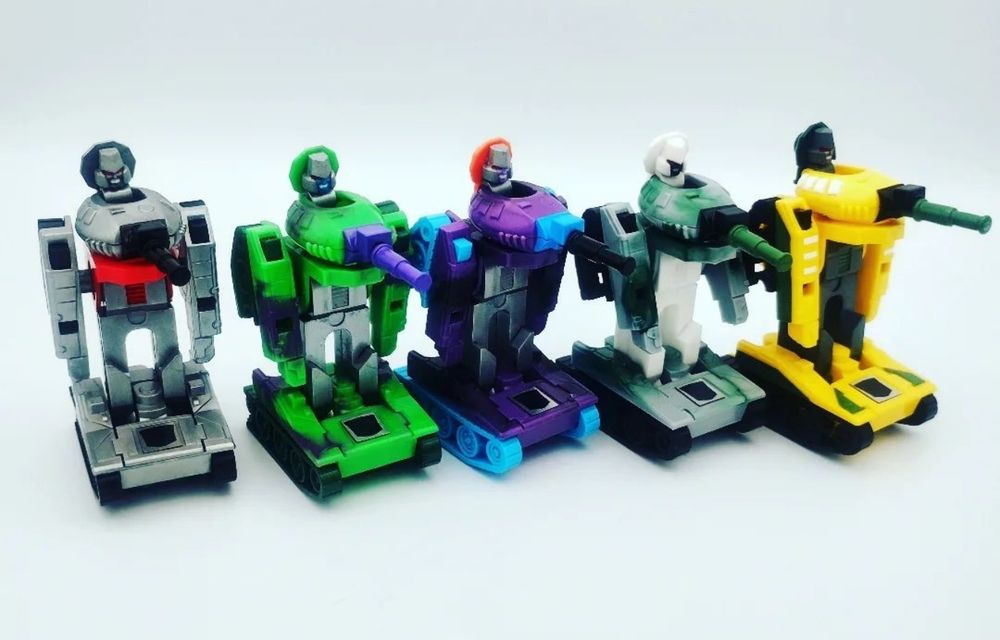 Five G1 Warpath moulds presented in distinct Megatron colour schemes, G1, G2 and the like. They have custom Megatron heads, too! Robot modes.