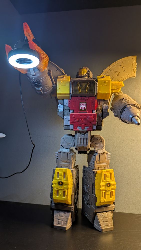 Titan Omega Supreme holding my webcam 