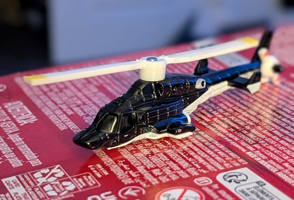 Out of the box. A little toy helicopter 