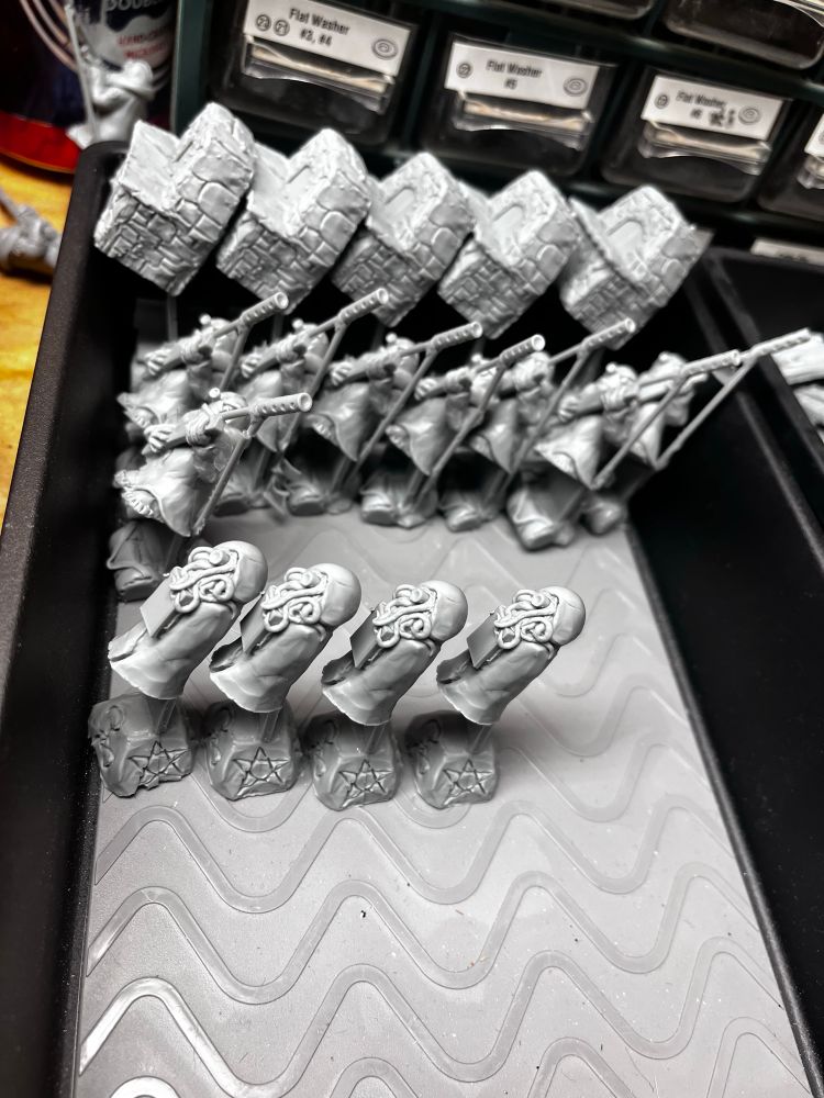 Rows of resin cast minis