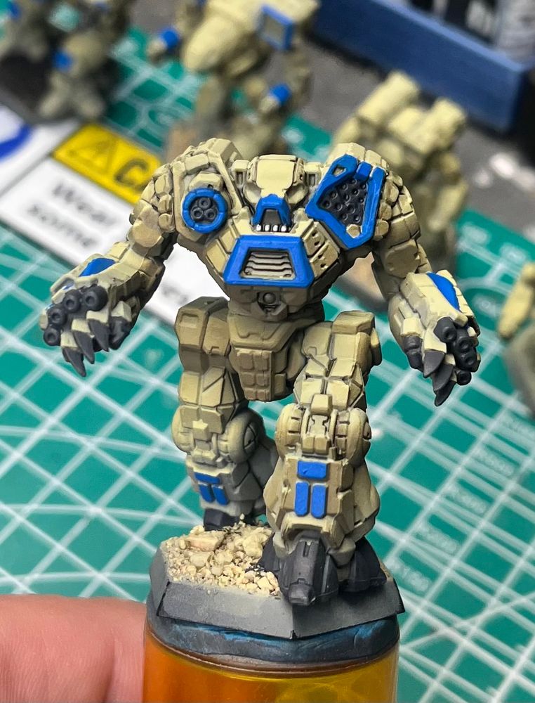 Battletech Kodiak model in canon colors, tan with blue trim