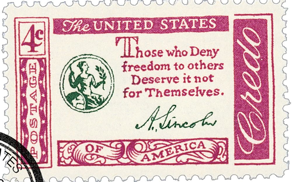 1960 4c stamp; rectangular with red ink as a stylized border, reading "The United States of America" on scrollwork, with "Credo" on the right-hand side vertically
Text in the center of the stamp reads
"Those who Deny freedom to others Deserve it not for Themselves."
With "A. Lincoln" signature underneath
And a small green roundel with a seated Liberty figure inset, holding a spear and a branch, shield at side.