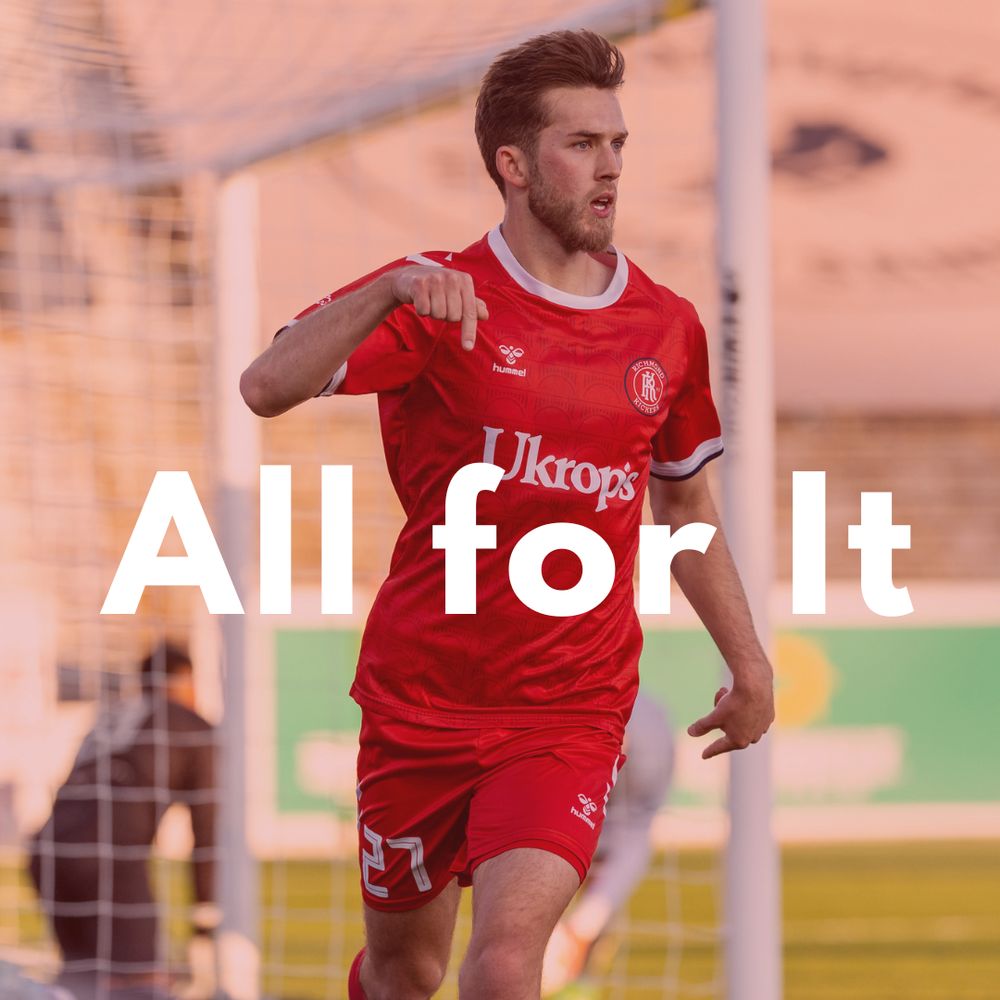 Chandler O'Dwyer celebrates after scoring for Richmond Kickers. He's pointing down and looking to his left.