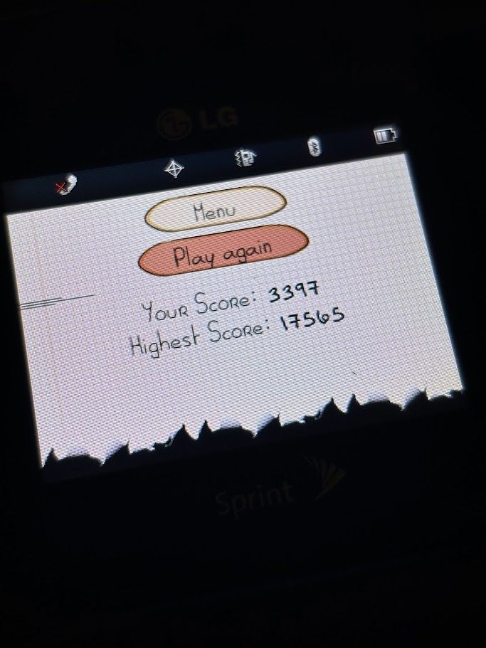 Playing the BREW version of Doodle Jump on an LG Lotus, recently patched to be able to run unsigned BREW apps. I got a laughable score of 3397 during this playthrough.
