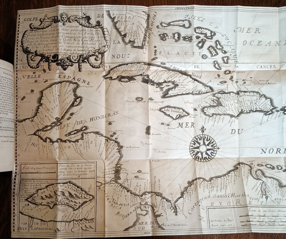 A large map of the Caribbean pull-out from a duodecimo book printed in 1686