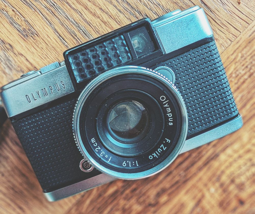Face-on view of an Olympus Pen D camera
