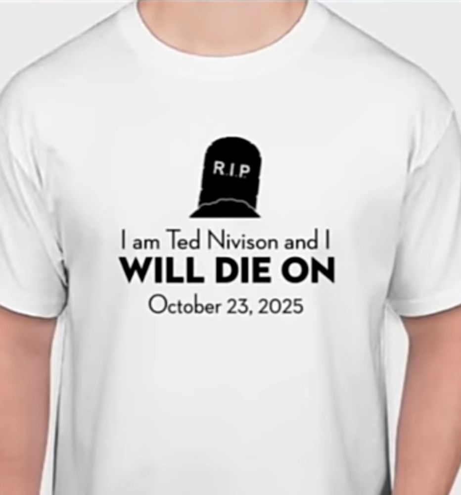 A t-shirt with a picture of a tombstone and text reading "I am Ted Nivison and I will die on October 23, 2025"
