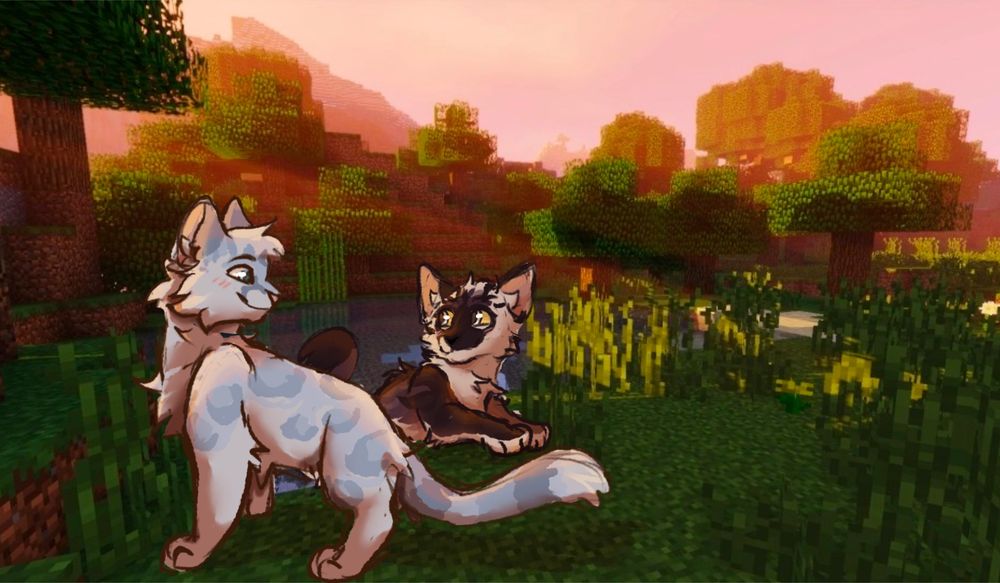 A minecraft screenshot with shaders on, making it look like there is a sunset. There are two cats in the foreground, one to the left which is standing, and is spotted and pale blue. And one on the right which is dark gray and white and laying down with its legs in the water