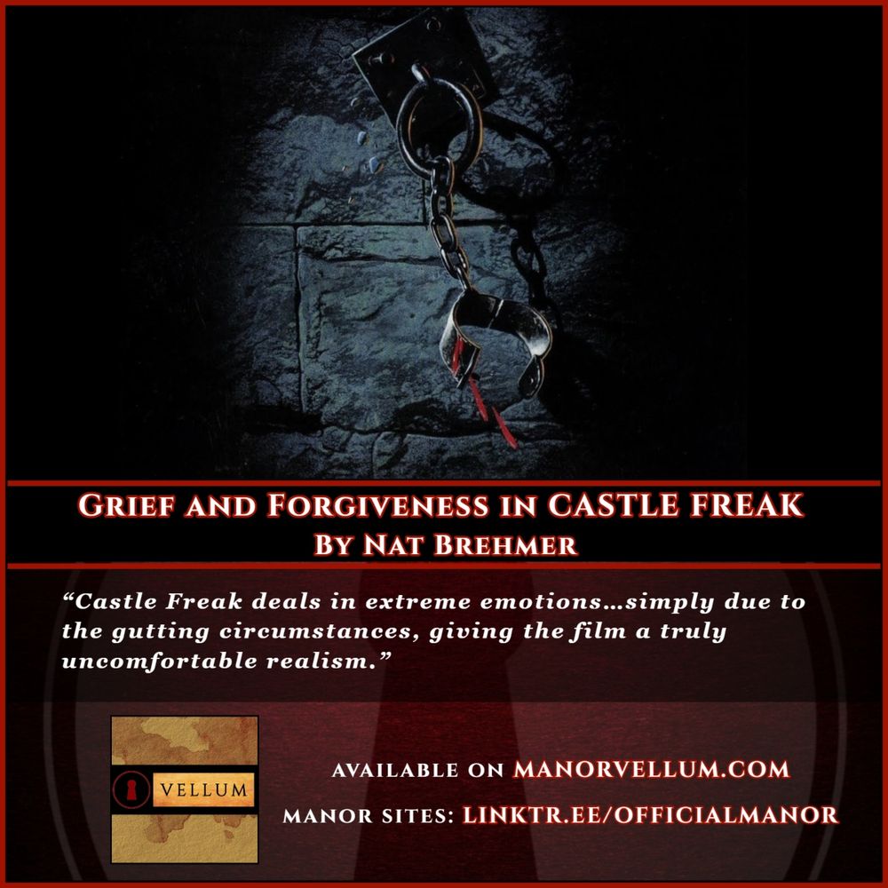 A handcuff chained to a dungeon wall drips blood.