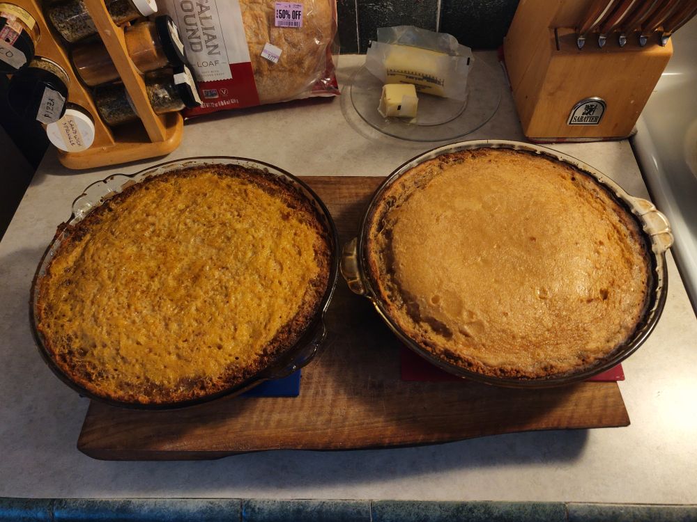 Two pies, one on the left is squash, the right is sweet potato 