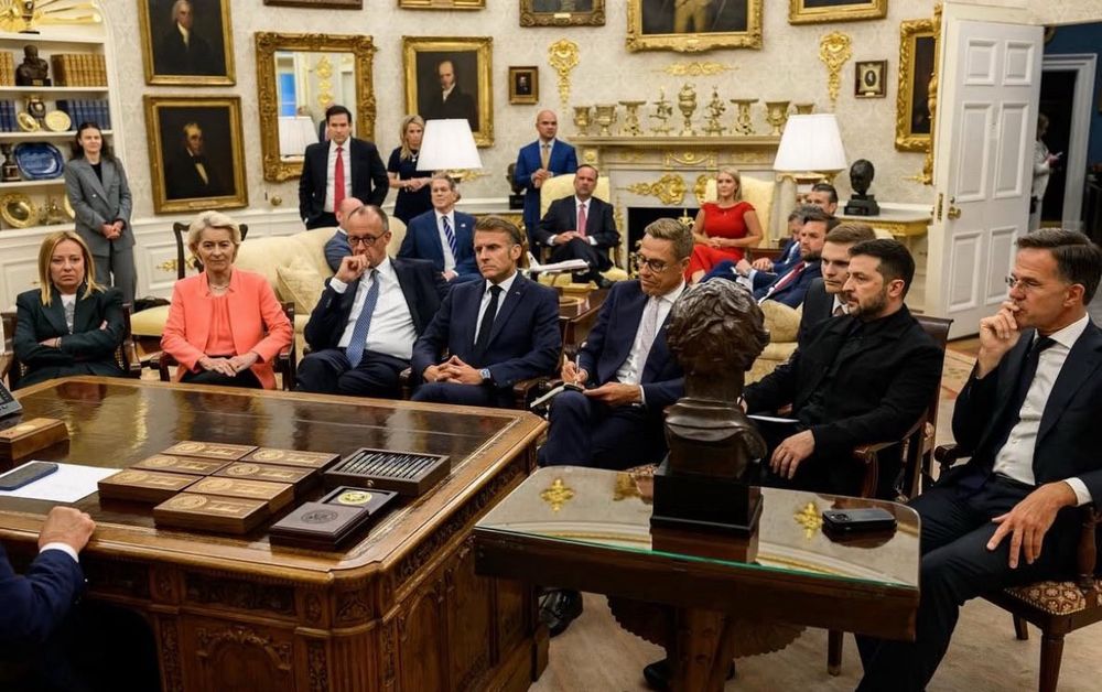 Photo from Trump’s POV behind his desk in the Oval Office of the European leaders and Zelensky all seated before him