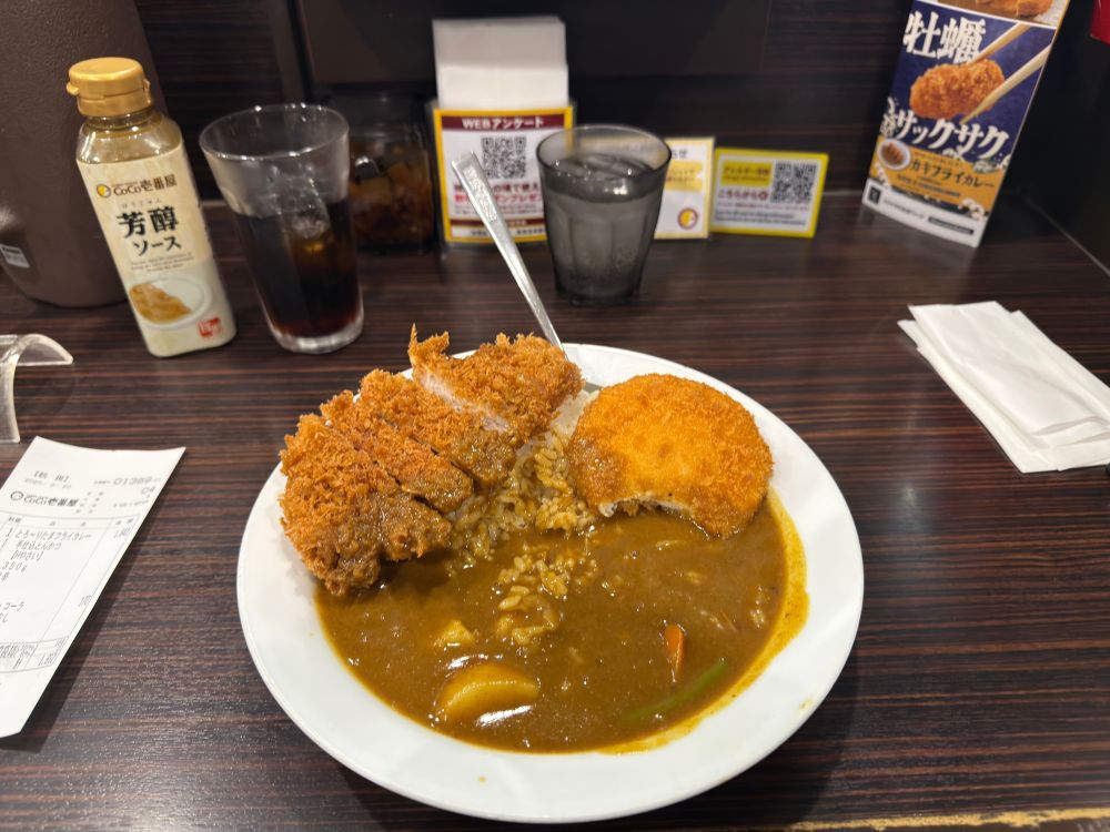 CoCoICHI curry with tonkatsu and a deep fried egg. 