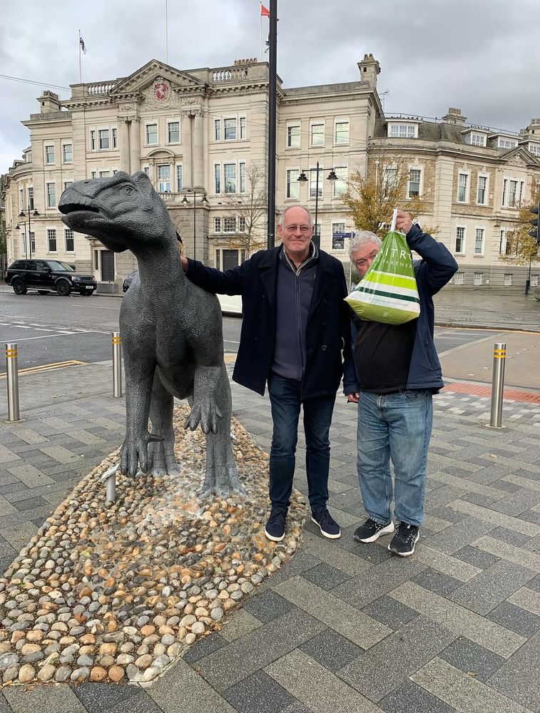 Me and Dodgy Pete posing by a dinosaur statue in Maidstone.