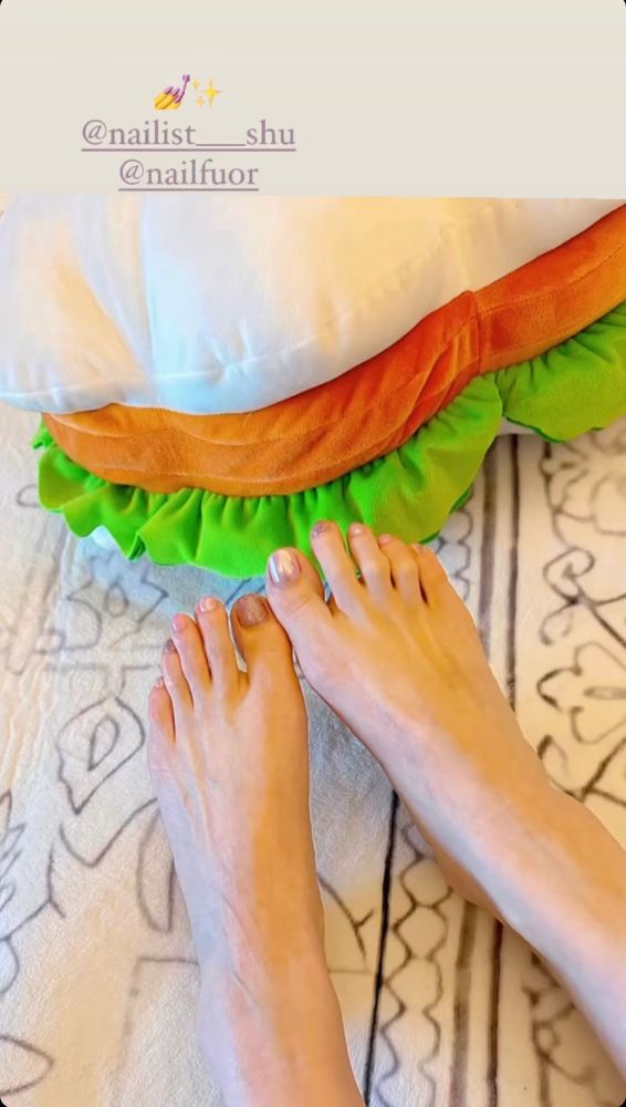 a photo of two freshly pedicured feet