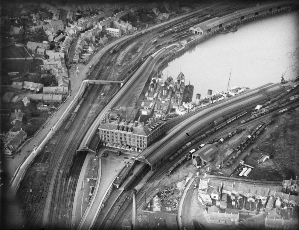 1923 Aerial photograph of Holyhead Port with ferries to Ireland docked behind Railway Hotel. 