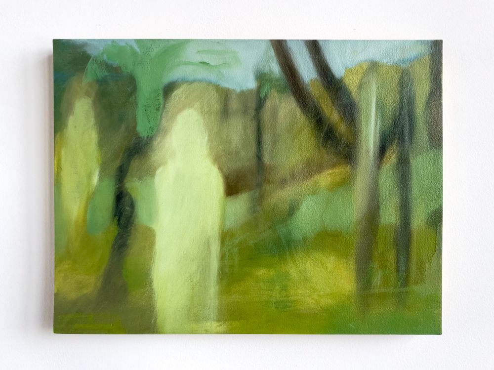 Glowing tombstone shaped figure in a rainy landscape with other figure-like shapes 