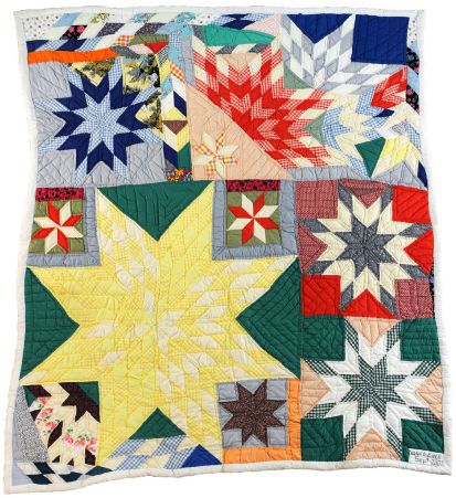 Patchwork quilt with scattered stars in yellow, red, blue and green.