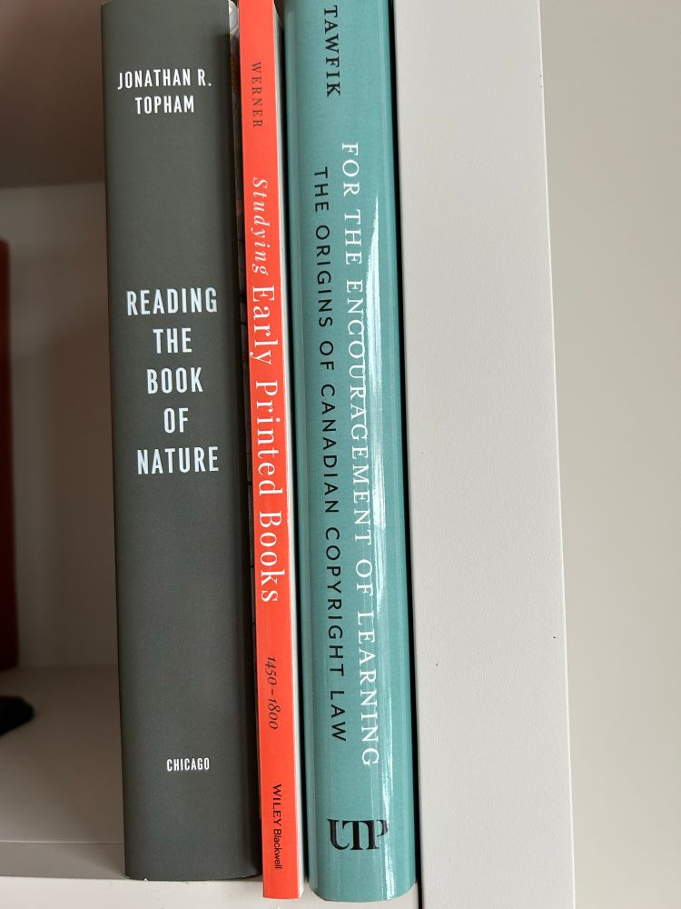 Spines of the 3 books mentioned. 