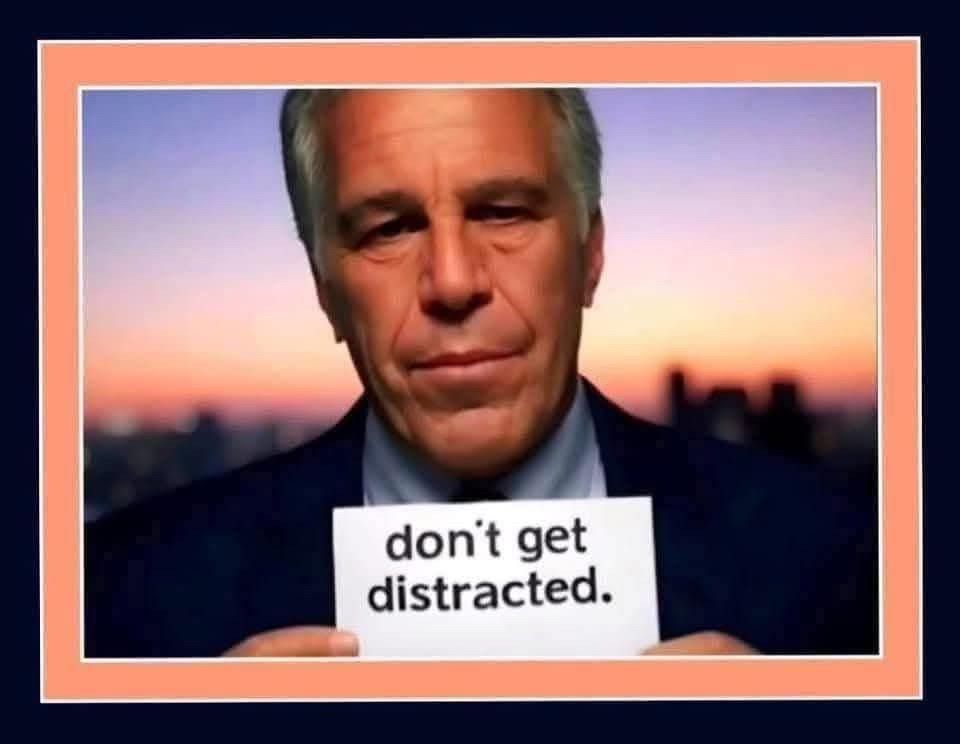 Epstein holding a note card that reads Don't get distracted.