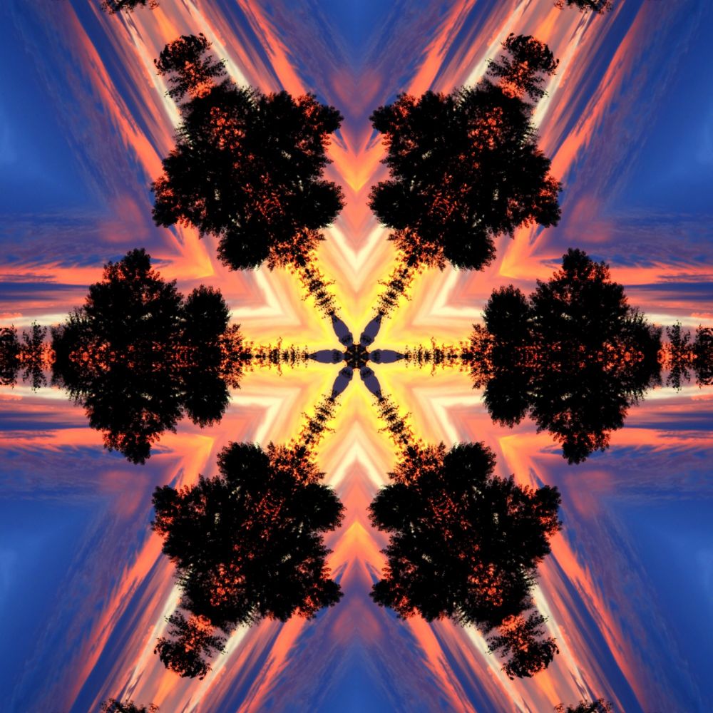 kaleidoscope image created from an orange and blue sunset photo