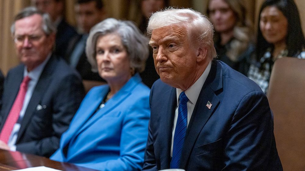 Wiles looks on at President Trump.
