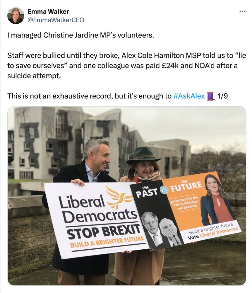 Picture of LIb Dems holding placards.